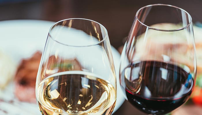 Glasses of red and white wines at Crestview's favorite restaurant and bar Samuel's Roadhouse